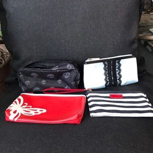Lot of 4 miscellaneous nonspecific branded cosmetic/ makeup bags